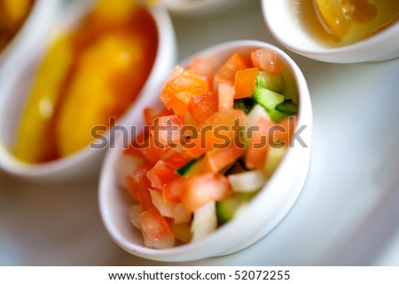 Small prep bowls filled with different fruit and veg.