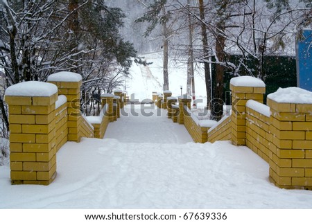 Stairs covered with snow in the park