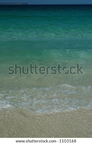 Gentle Waves on a Tropical Beach