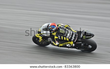 SEPANG, MALAYSIA - FEBRUARY 3: MotoGP rider Colin Edwards of Monster Yamaha Tech 3 Team practices at the MotoGP winter tests at the Sepang International Circuit on February 3, 2011 in Malaysia.
