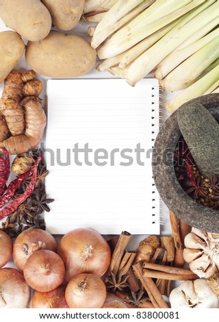 open notebook ready for writing recipe with various food ingredients