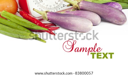 vegetables and measure on white background with text sample