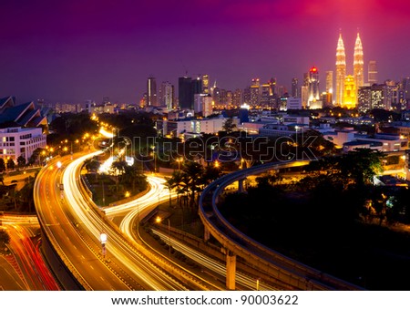 Stunning light trail scenery at the busy highway in Kuala Lumpur city at night