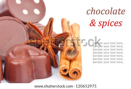 Different sweet chocolate candies and spice isolated on white background, food photo & text