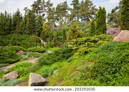 Land-art-park; landscaping with plant; pond and walkway for relax
