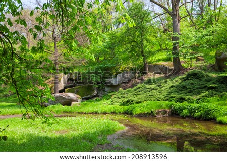 Land-art-park, landscaping with plant, pond and walkway for relax