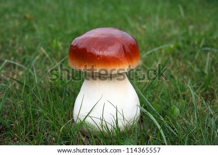 Garden decor - wooden mushroom in grass
