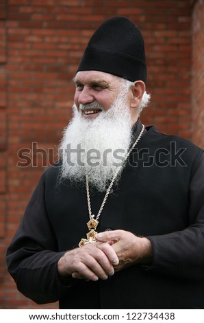 Orthodox Christian priest with a long white beard