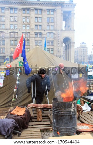 KIEV, UKRAINE - 20 DECEMBER: Protest on Euromaydan in Kiev against the president Yanukovych did not sign the contract between European Union and Ukraine on 20 December, 2013 in Kiev, Maidan, Ukraine