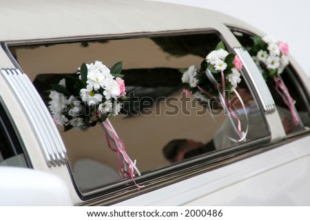 Decorated limousine on the wedding day