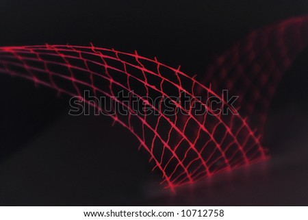 Closeup of back pink wavy decoration (net, wire)