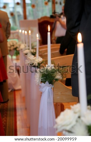 stock photo Wedding decorations of candles in the church