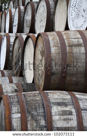 stacked whiskey barrels, Ben Nevis Distillery, Scotland