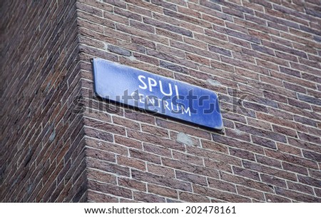 Amsterdam, Netherlands, 20 JUNE 2014: Name tag that refers to the Spui in Amsterdam centrum.