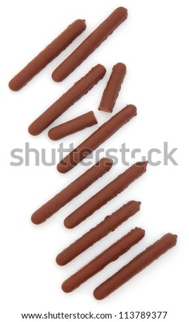 Chocolate finger biscuit abstract pattern with one in half over white background.