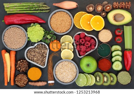 Liver detox diet health food concept with fruit, vegetables, herbal medicine, seeds, nuts, grains, cereals, and supplement powders. High in antioxidants, omega 3, vitamins &  dietary fibre. Top view.