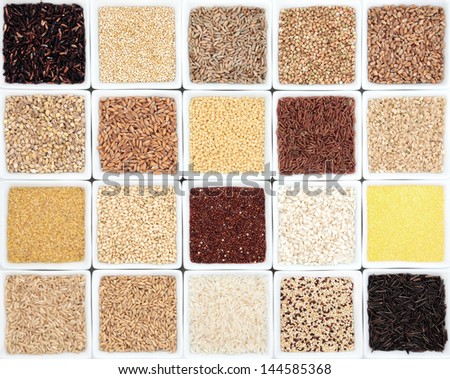 Large healthy grain food selection in white dishes.
