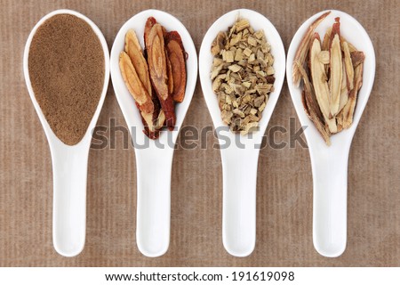 Liquorice chinese herbal medicine including powder, honey coated, chopped and sliced root. Left to right.