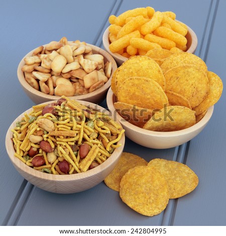 Savory snack party food selection in wooden  bowls.