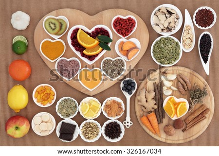 Large health food for cold cure high in antioxidants and vitamin c with supplement capsules and medicinal herbs and spices.