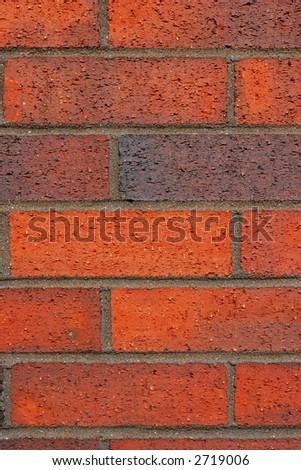 Red brick and mortar wall.