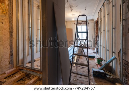 Interior of upgrade apartment with materials during on the remodeling, renovation, extension, restoration, reconstruction and construction. ( making wall from gypsum plasterboard)