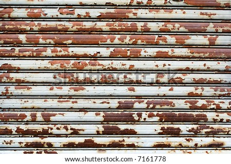 Worn Metal Panel Wall Store Front Section with Rust and Cracked and Peeling Paint, Texture Background Grunge, Horizontal