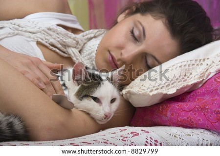 Sleeping woman with cat