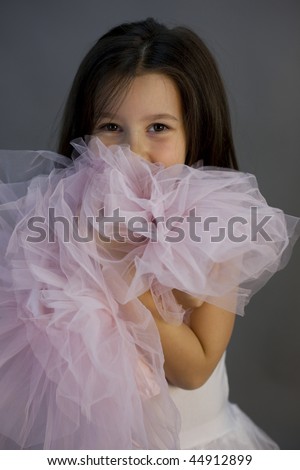 Sweet little ballerina girl with her first tutu