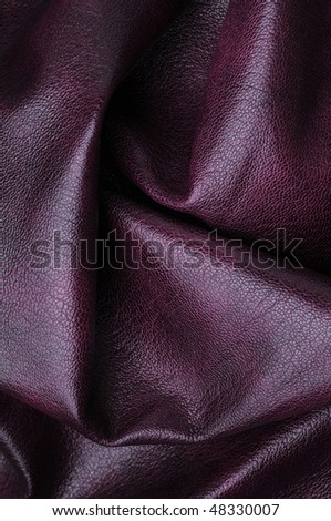 Texture of folds, claret skin