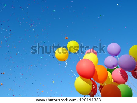 multicolored balloons and confetti in the city festival#7