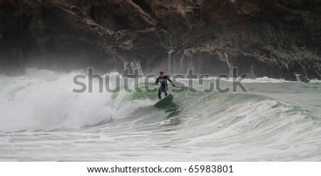 NAZARE, PORTUGAL - NOVEMBER 26 : Garrett McNamara in sup surfing The North Canyon Show by Garrett McNamara November 26, 2010 in Nazare, Portugal