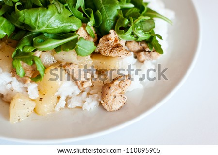 plate full of rice, meat and vegetables