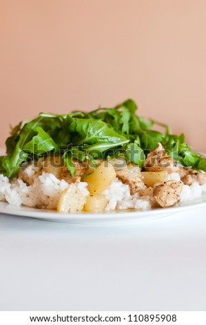 chicken with pear and rucola plate full of dish