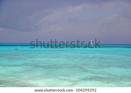 crystal blue ocean water of Caribbean Cancun Mexico