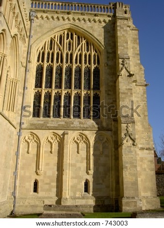 Gothic window  in morning sun, Winchester cathedral England