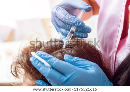 Platelet rich plasma injection procedure. Hair growth stimulation. PRP therapy process.