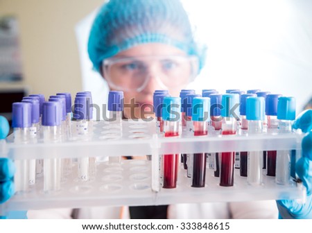 Medic staff at work in the laboratory. Background
