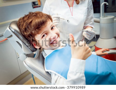 Little boy smiling in the dental office.