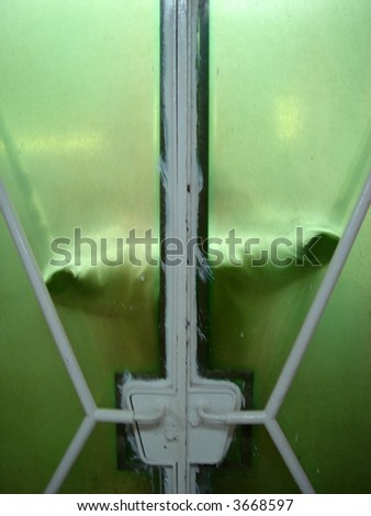 Shoulders Behind a Translucent door