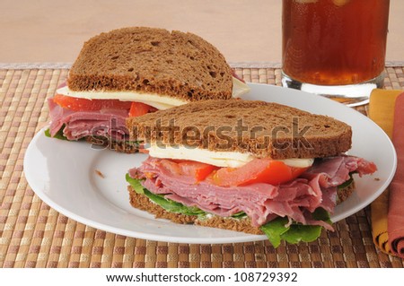 A corned beef sandwich on dark rye bread