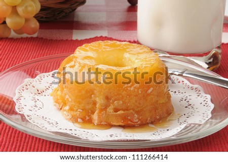 An individual pineapple upside cake