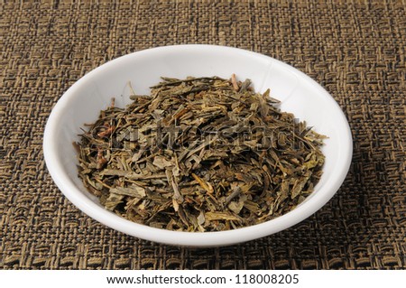 A sample dish of organic whole leaf green tea