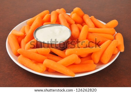 Baby carrot sticks with ranch dressing