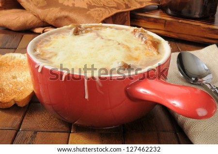 French onion soup topped with Gruyere cheese and toast