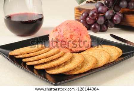 A port wine cheeseball with crackers