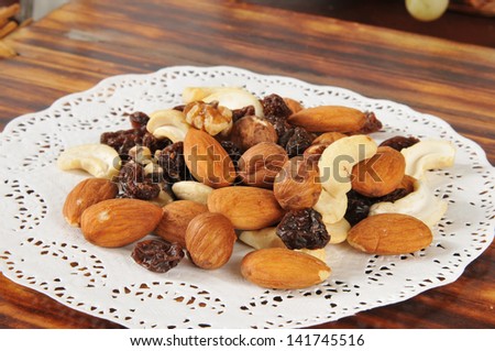 A serving of healthy trail mix on a doily