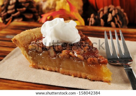 A Slice Of Pecan Pie On A Holiday Setting