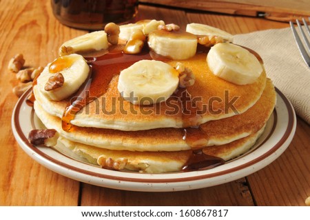 Banana nut pancakes with maple syrup