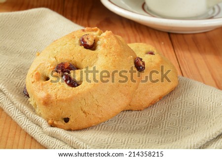 Gourmet cranberry orange cookies with a cup of coffee
